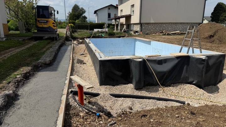 Excavation and earthworks by a house