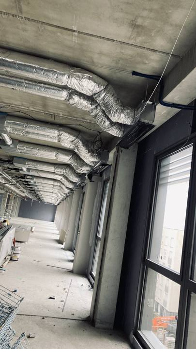 Duct routing in a corridor